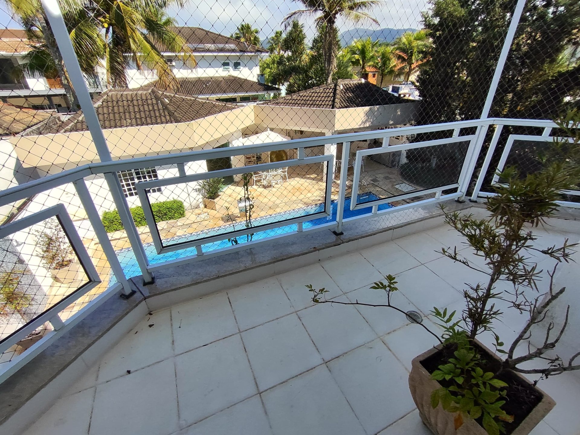 Casa em frente à praça, perfeita para quem busca conforto, espaço e lazer completo! em Jardim Acapulco, Guarujá — foto 35